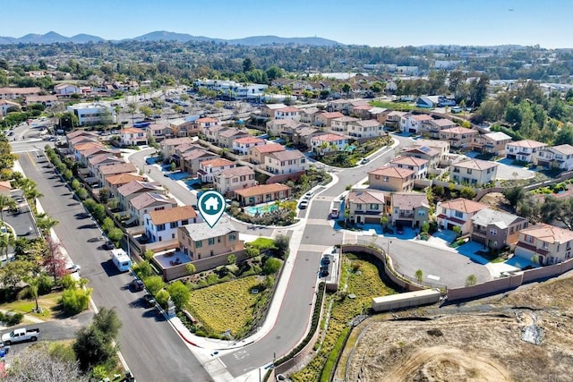 birds eye view of property featuring a residential view and a mountain view