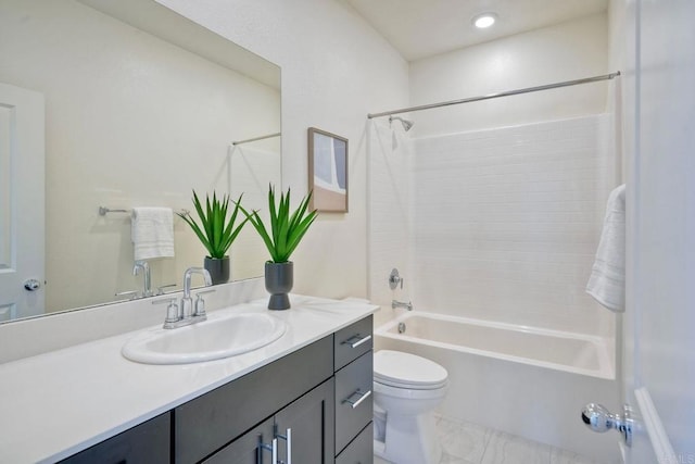 full bathroom featuring toilet, shower / bathing tub combination, and vanity