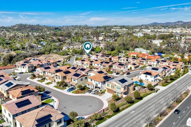 bird's eye view featuring a mountain view and a residential view