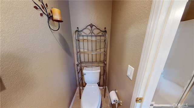 11318 Fitzpatrick Dr, Rancho Cucamonga, CA 91730 - bathroom with toilet and a textured wall