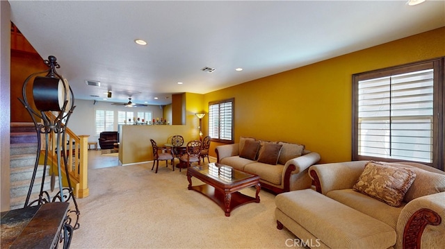 11318 Fitzpatrick Dr, Rancho Cucamonga, CA 91730 - carpeted living room featuring recessed lighting, stairway, baseboards, and ceiling fan