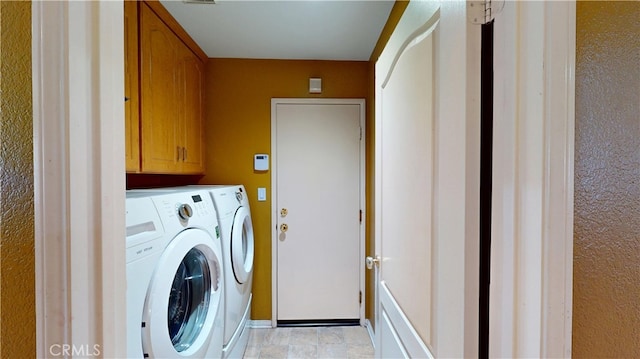 11318 Fitzpatrick Dr, Rancho Cucamonga, CA 91730 - laundry area with separate washer and dryer, cabinet space, and a textured wall