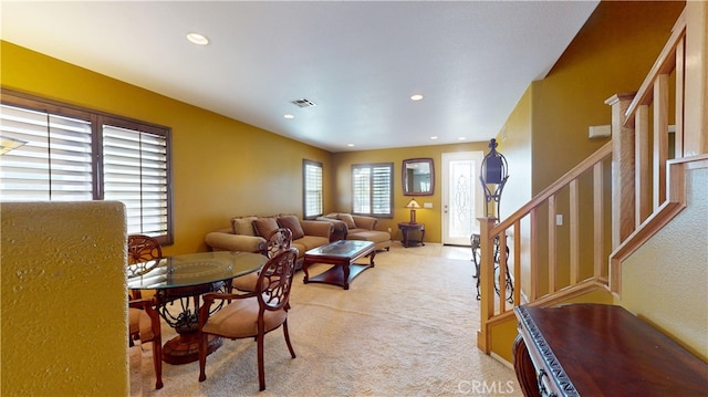 11318 Fitzpatrick Dr, Rancho Cucamonga, CA 91730 - living area with light carpet, stairs, and recessed lighting