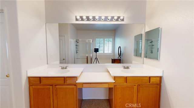 full bath with double vanity, a sink, and a shower stall