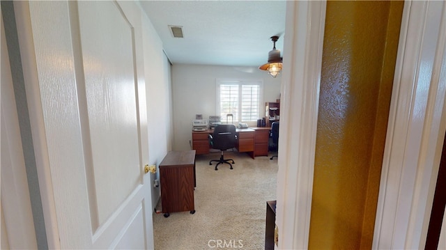 office with visible vents and light colored carpet