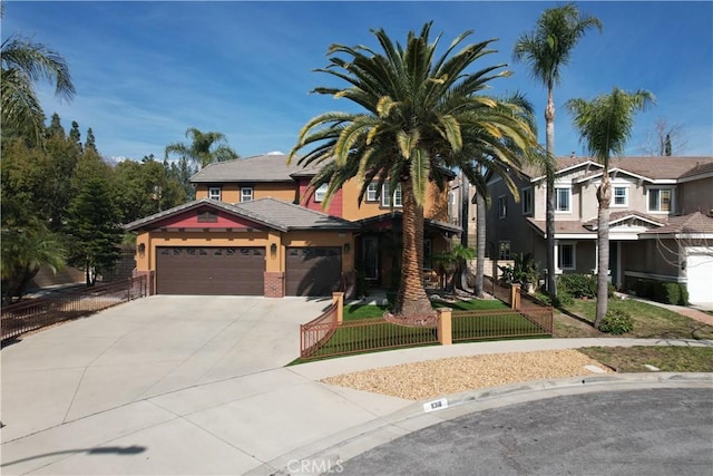 11318 Fitzpatrick Dr, Rancho Cucamonga, CA 91730 - view of front facade with a fenced front yard, concrete driveway, a garage, a residential view, and stucco siding