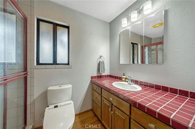 18945 Timber Point Rd, Hidden Valley Lake, CA 95467 - full bathroom with toilet, a textured wall, and a shower stall