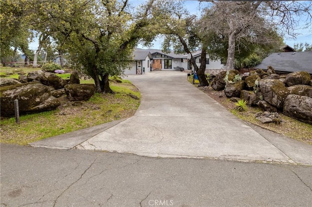 18945 Timber Point Rd, Hidden Valley Lake, CA 95467 - ranch-style home with driveway and an attached garage