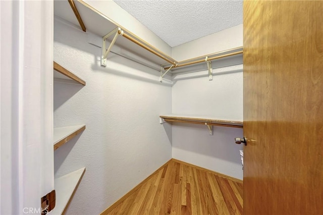 18945 Timber Point Rd, Hidden Valley Lake, CA 95467 - walk in closet with wood finished floors