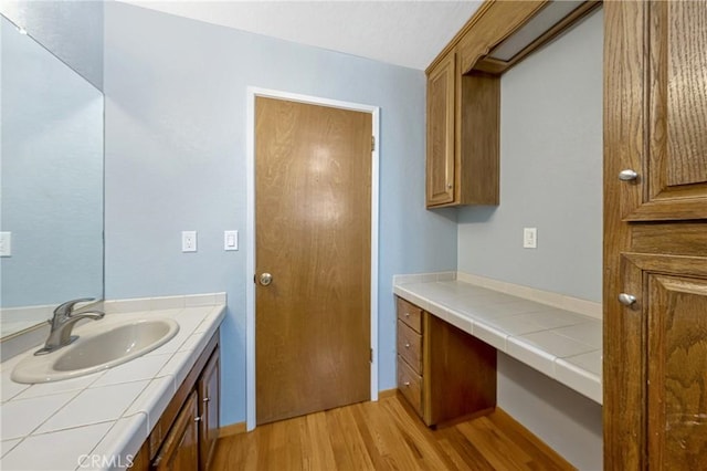 18945 Timber Point Rd, Hidden Valley Lake, CA 95467 - bathroom featuring wood finished floors and vanity