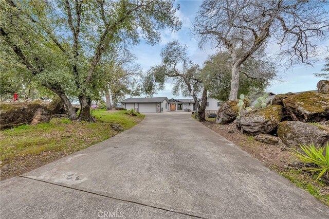 18945 Timber Point Rd, Hidden Valley Lake, CA 95467 - ranch-style home featuring driveway and an attached garage