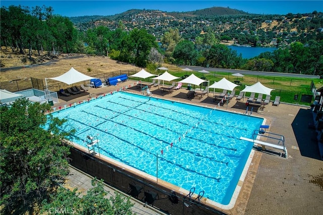 18945 Timber Point Rd, Hidden Valley Lake, CA 95467 - community pool with a patio, a gazebo, a diving board, a mountain view, and fence