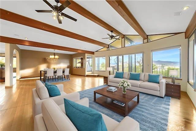 18945 Timber Point Rd, Hidden Valley Lake, CA 95467 - living area featuring a wealth of natural light, baseboards, and ceiling fan with notable chandelier