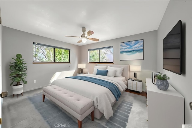 18945 Timber Point Rd, Hidden Valley Lake, CA 95467 - bedroom featuring baseboards, ceiling fan, and multiple windows