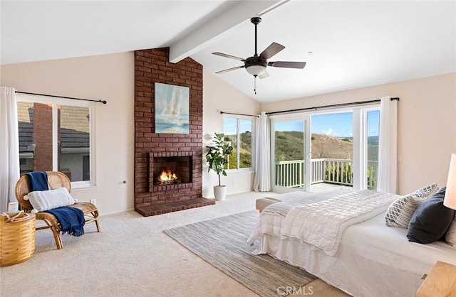 bedroom with vaulted ceiling with beams, carpet flooring, a ceiling fan, access to outside, and a brick fireplace