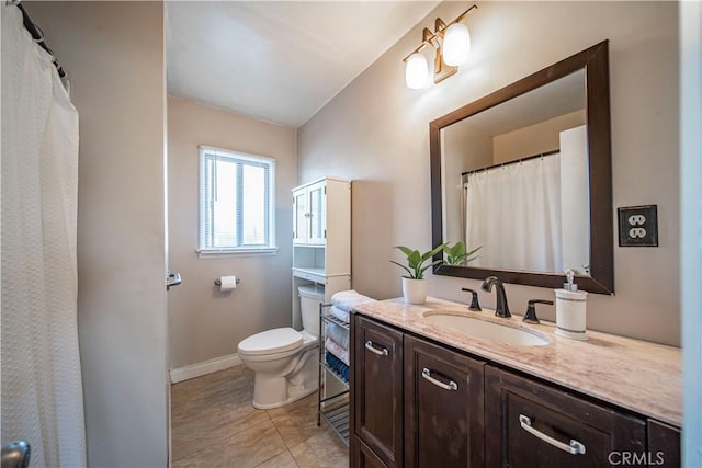 full bath featuring toilet, tile patterned floors, baseboards, and vanity