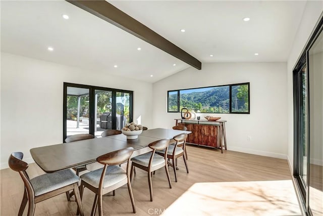 dining room with french doors, vaulted ceiling with beams, recessed lighting, light wood-style flooring, and baseboards