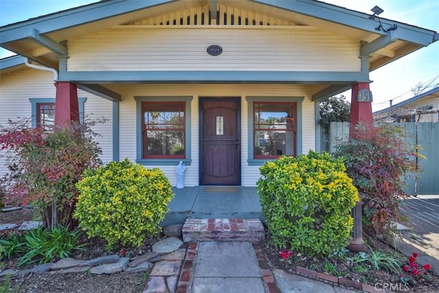 doorway to property featuring covered porch