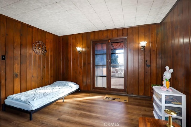 bedroom with wood finished floors