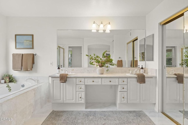 full bath with double vanity, a shower stall, and a bath