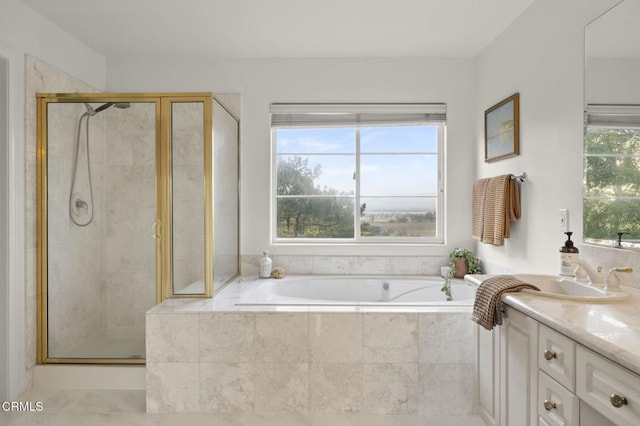 full bath featuring a stall shower, a bath, and vanity