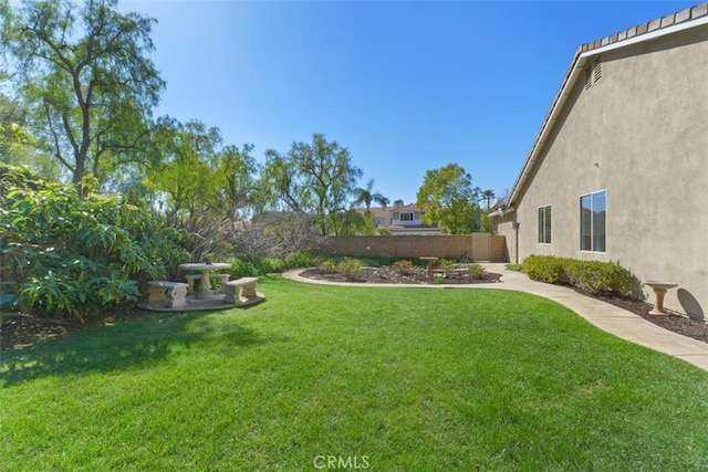 view of yard with fence