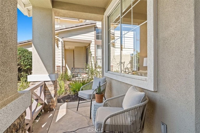 balcony featuring a porch