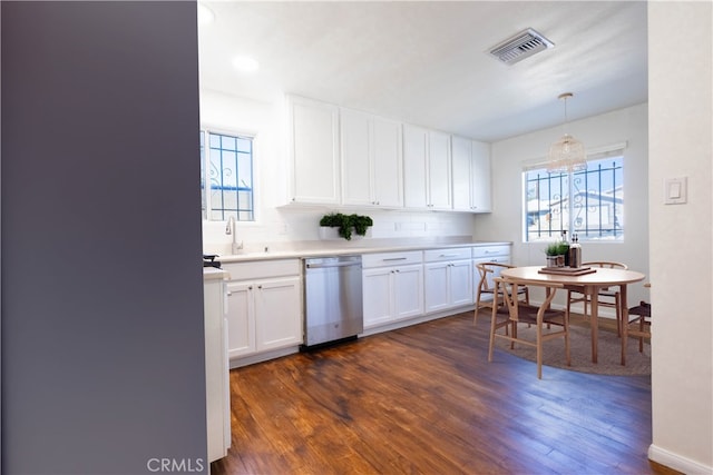 kitchen with visible vents, dishwasher, decorative light fixtures, light countertops, and white cabinetry