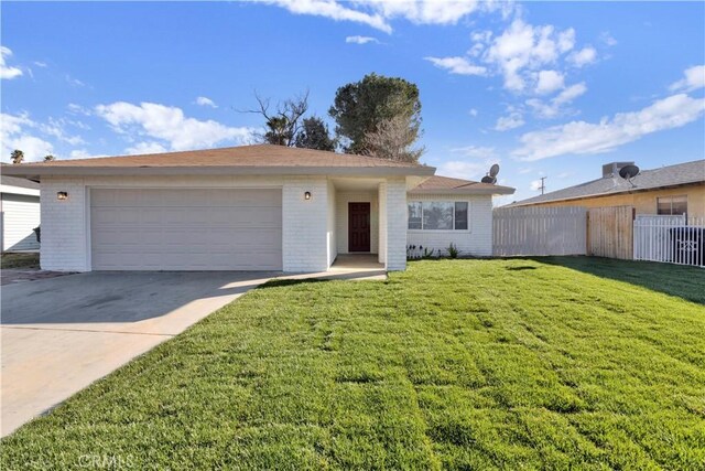 ranch-style home featuring brick siding, concrete driveway, an attached garage, a front yard, and fence