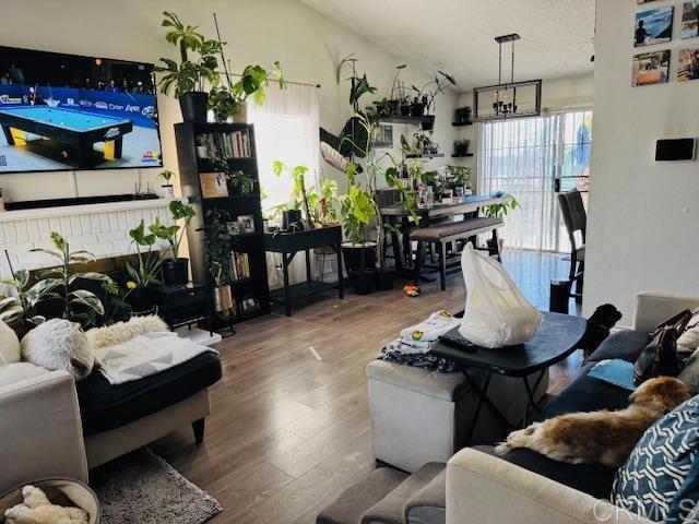 living area with wood finished floors