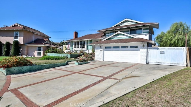 traditional-style house with driveway, a garage, and brick siding