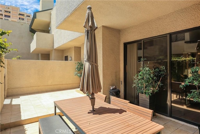 view of patio with outdoor dining area