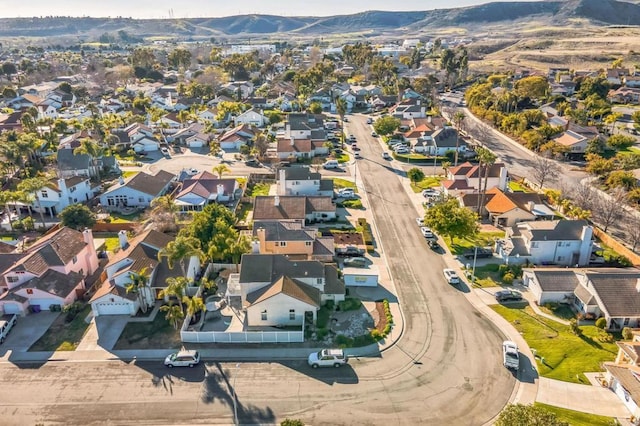 bird's eye view featuring a residential view and a mountain view