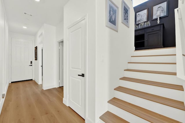 36540 Diego Springs Ave, Murrieta, CA 92563 - stairs with recessed lighting, baseboards, visible vents, and wood finished floors