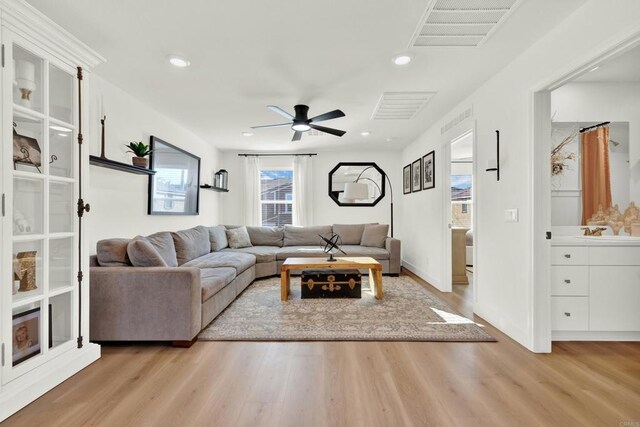 36540 Diego Springs Ave, Murrieta, CA 92563 - living area with ceiling fan, wood finished floors, and visible vents