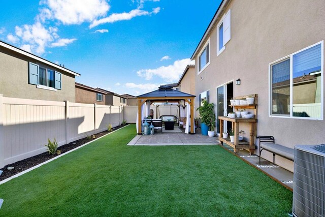 36540 Diego Springs Ave, Murrieta, CA 92563 - view of yard with central air condition unit, a patio, a gazebo, and a fenced backyard