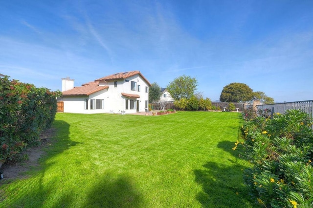 view of yard featuring a fenced backyard