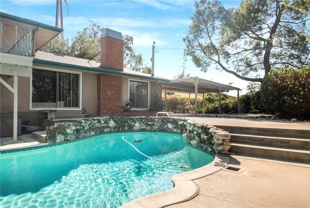 pool featuring a patio