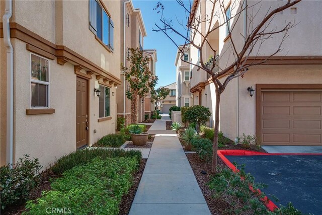 711 Banyan Way, Pomona, CA 91767 - exterior space with a garage