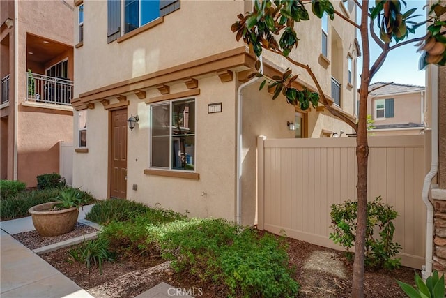 711 Banyan Way, Pomona, CA 91767 - entrance to property with fence and stucco siding