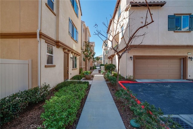 711 Banyan Way, Pomona, CA 91767 - exterior space featuring an attached garage