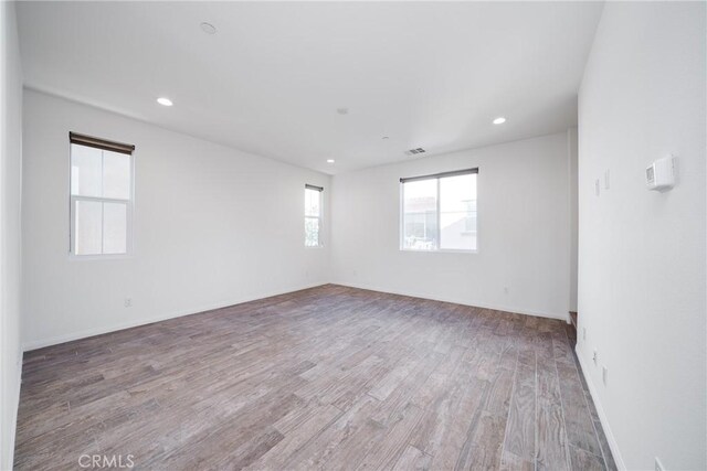 711 Banyan Way, Pomona, CA 91767 - spare room featuring recessed lighting, visible vents, and light wood finished floors