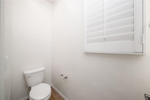 711 Banyan Way, Pomona, CA 91767 - bathroom with baseboards and toilet