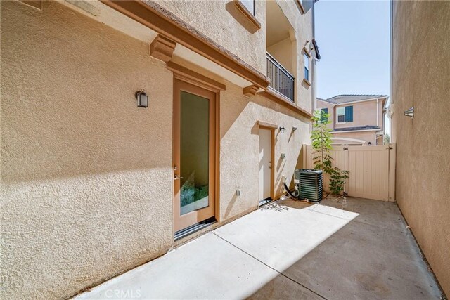 711 Banyan Way, Pomona, CA 91767 - view of patio / terrace featuring fence and cooling unit