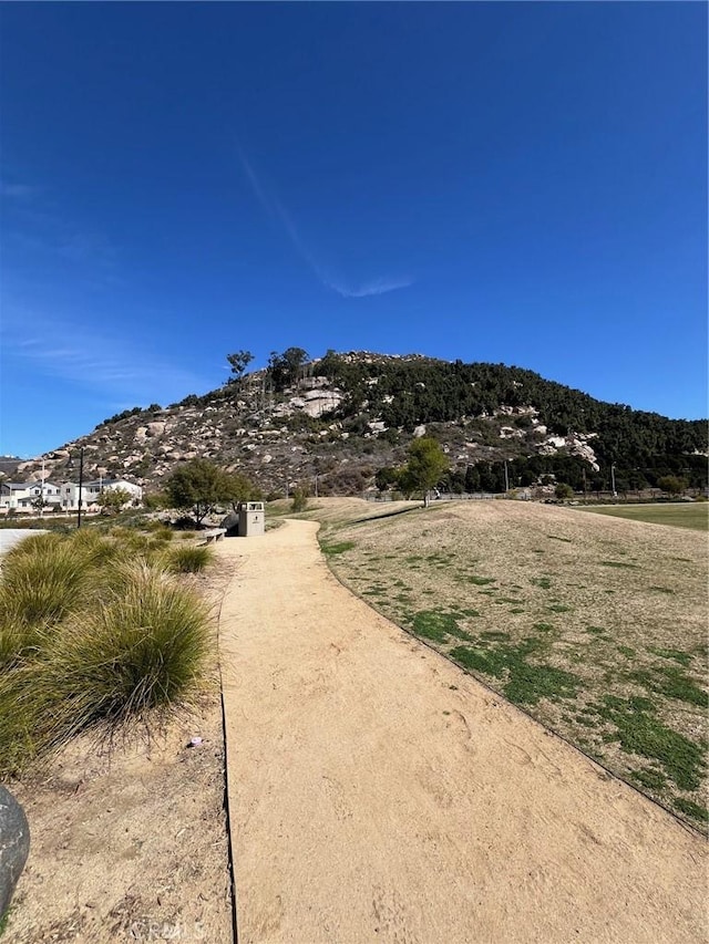 surrounding community with a mountain view