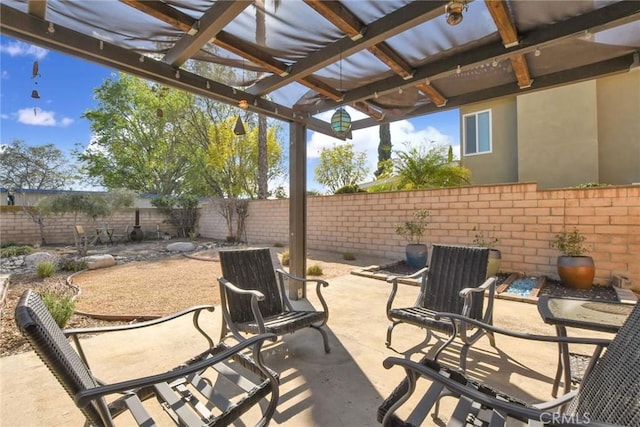 view of patio featuring a fenced backyard and a pergola