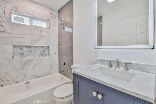 full bath featuring toilet, shower / washtub combination, and vanity