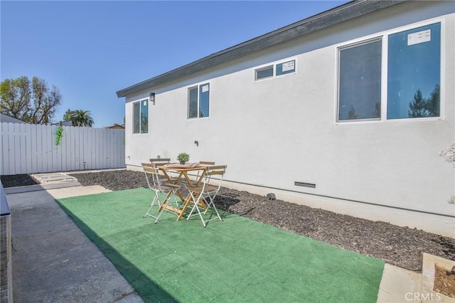 view of yard featuring a patio area and fence