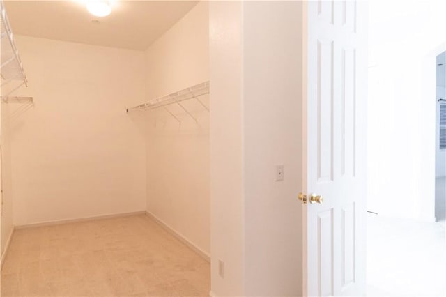 1594 Margit St, Redlands, CA 92374 - walk in closet featuring light carpet