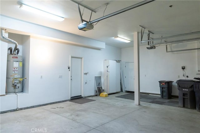 1594 Margit St, Redlands, CA 92374 - garage with a garage door opener and strapped water heater
